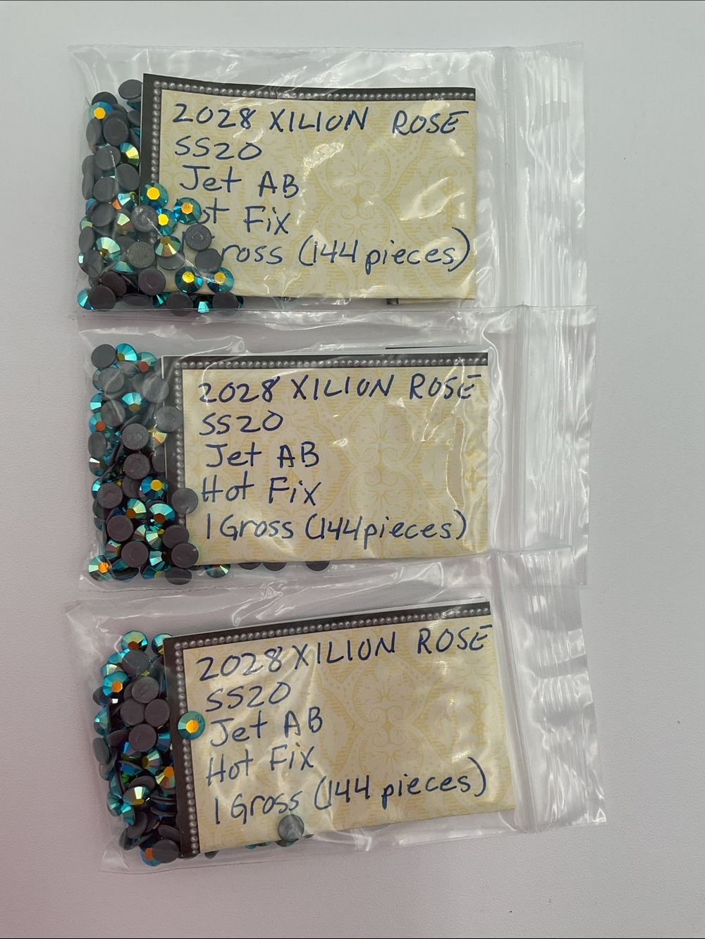 Swarovski • Color: Jet Aurora Borealis, 2028 XILION Rose Hotfix Rhinestones